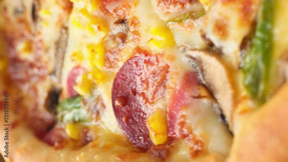 Medium mixed topping pizza in macro shot 360 degree shot on rotating table,vertical video
Medium mixed topping pizza in macro shot 360 degree shot on rotating table,vertical video