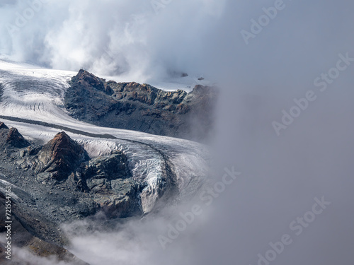 Misty swiss mountain landscape on the Gornergrat above Zermatt in the canton of Valais