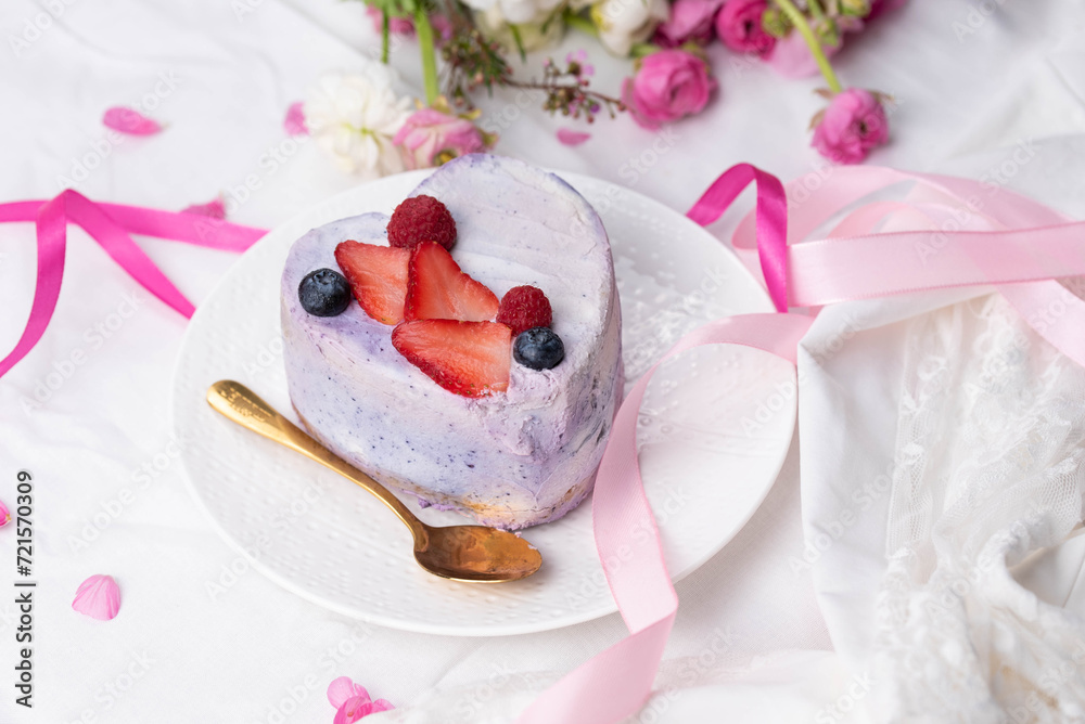 Trendy bento cake in love heart shape form on a light breakfast in bed background. Cake for Valentine's Day, Mother's Day, or Birthday, Love Forever Message, Romantic Bento Cake for Two Trendy bento cake in love heart shape form on a light breakfast in bed background. Cake for Valentine's Day, Mother's Day, or Birthday, Love Forever Message, Romantic Bento Cake for Two