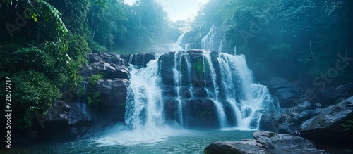 Captivating Waterfalls Cascading Over Majestic Rocks: A Breathtaking Display of Waterfalls Over Rocks Embracing Nature's Beauty