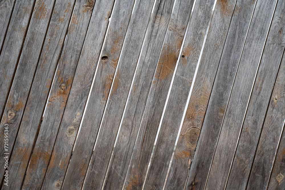 Aged thin wooden boards with knots