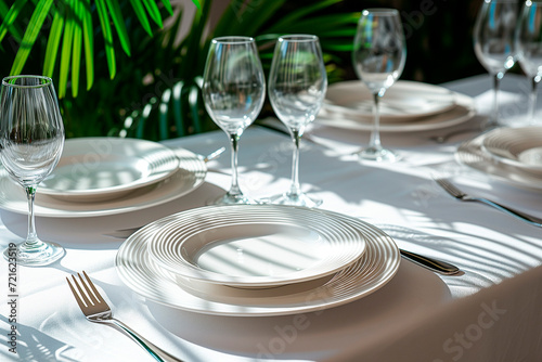 Wallpaper Mural Beautiful table setting for festive family dinner with spring flowers in sun light. Torontodigital.ca