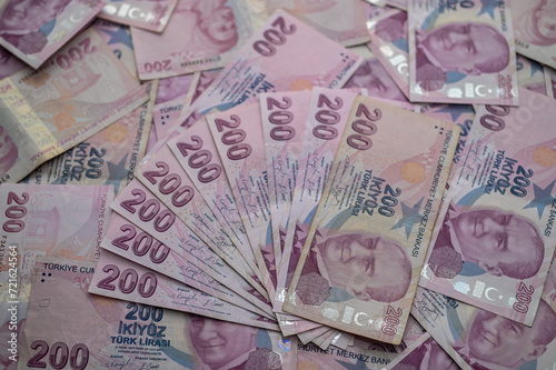 Fototapeta Naklejka Na Ścianę i Meble -  Gaziveren, Cyprus 01/27/2024 - a pack of 200 Turkish lira bills 9