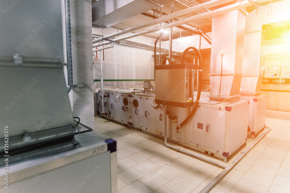 Interior industrial gas boiler with a lot of piping, pumps and valves Interior industrial gas boiler with a lot of piping, pumps and valves
