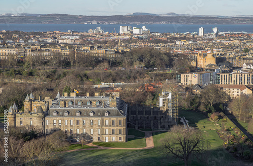 Aerial view of Palace of Holyroodhouse and Holyrood Park seen from the top of Salisbury Crags. Amazing Edinburgh Cityscape, Destinations in Europe, Copy space, Selective focus. photo