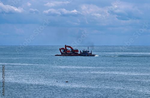 Mid lake dredging operation for salt mining - scenes from Bayfield, Huron County, ON, Canada