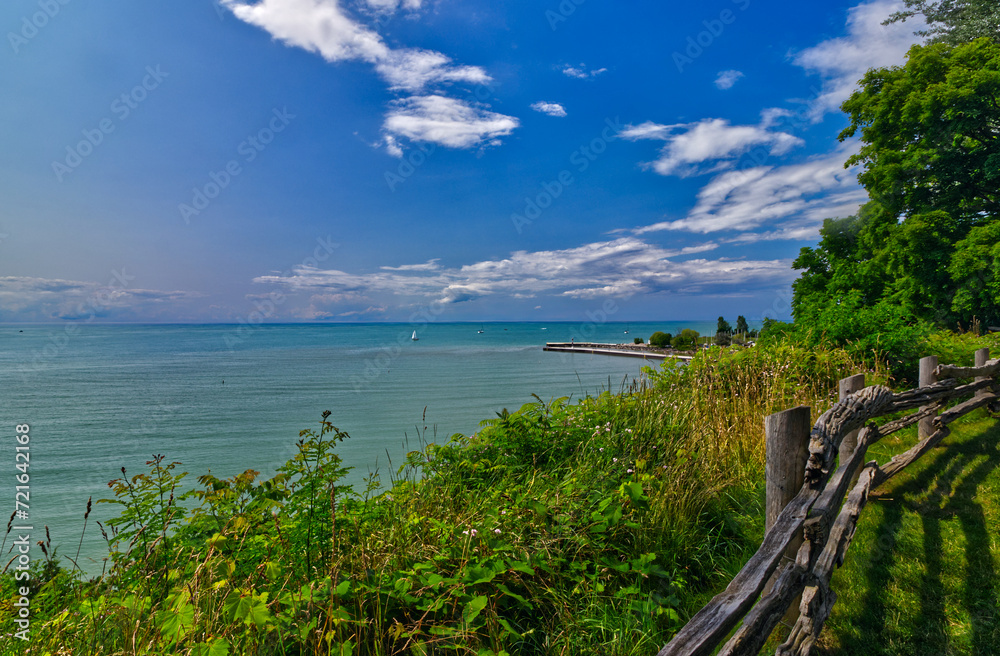 Perfect mix of green trees, blue sky, teal waters and beautiful clouds - scenes from Bayfield, Huron County, ON, Canada