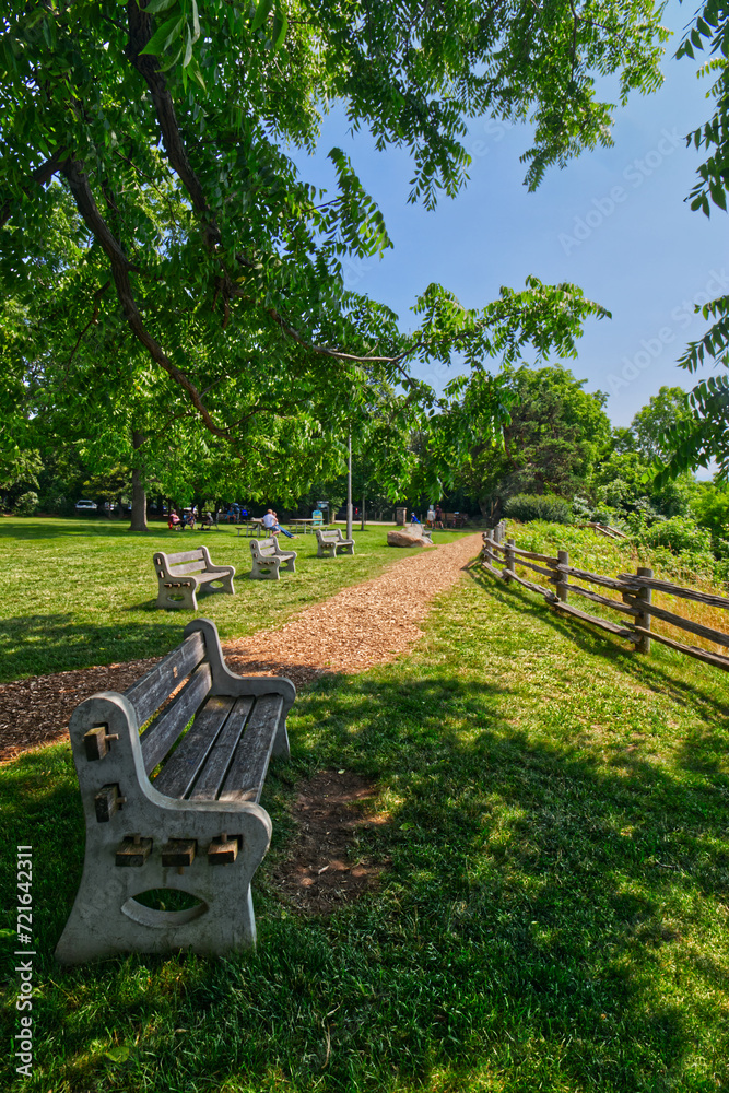 Park benches facing the Lake Huron to spend endless summer afternoons - scenes from Bayfield, Huron County, ON, Canada Park benches facing the Lake Huron to spend endless summer afternoons - scenes from Bayfield, Huron County, ON, Canada