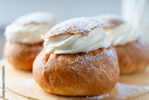 Semla or vastlakukkel is a traditional sweet roll with whipped cream made in Scandinavic, Baltic countries photo