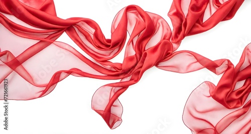 Flying red silk chiffon fabric on a white background. Weightless silk fabric.