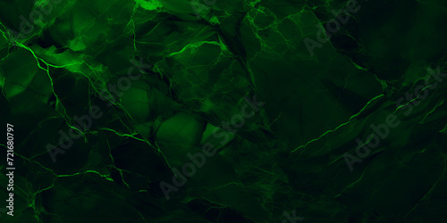 Wide panoramic surface of green marble abstract stone texture with neon veins dark tone. For banner  background design