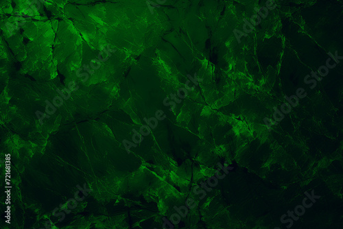 Green neon stone background banner wallpaper design. Dark rock grunge texture. Mountain surface close-up cracked empty copy space