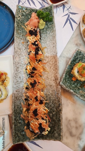 Afuro Samurai Sushi Rolls served with sauces and caviar.