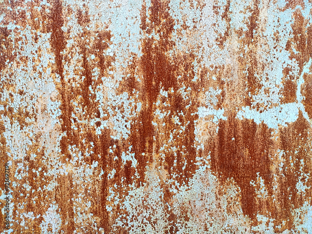 Corroded metal background. Rusty metal background with streaks of rust. Rust stains. Rusty corrosion.