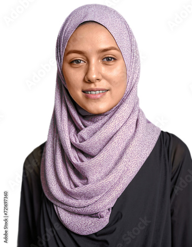 A woman smiles wearing a hijab (ID: 721697360)