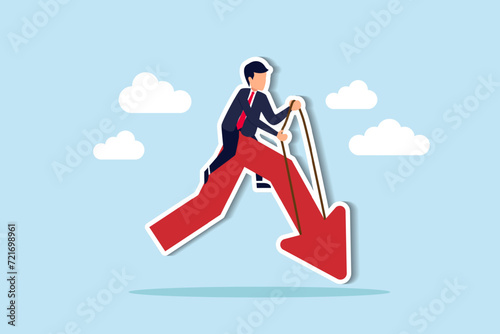 Stock market or crypto currency crash and going down, economic crisis or investing risk, volatility and fluctuation concept, businessman investor rodeo riding uncertainty decline red arrow graph.
