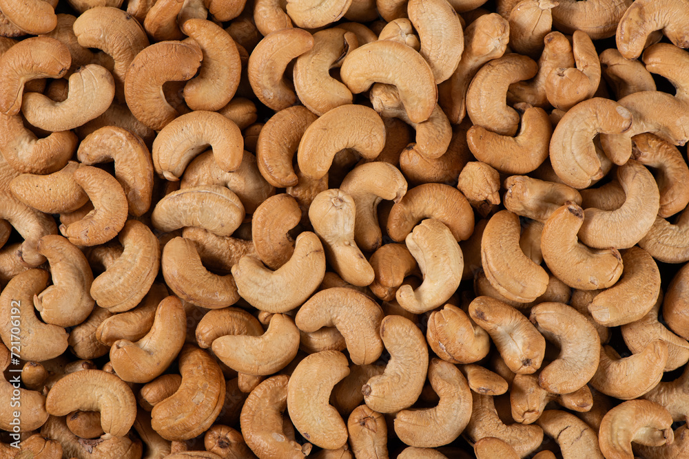 roasted salted cashew nuts texture background. roasted salted cashew nuts texture background.