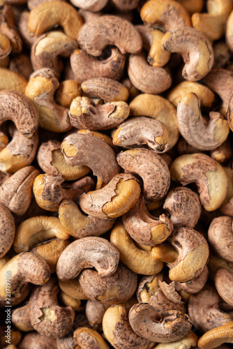 roasted salted cashew nuts texture background.
