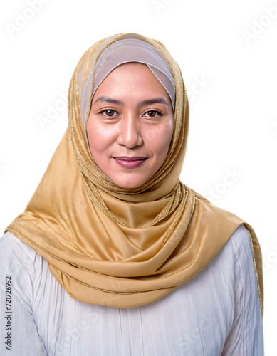 A woman smiles wearing a hijab (ID: 721726932)