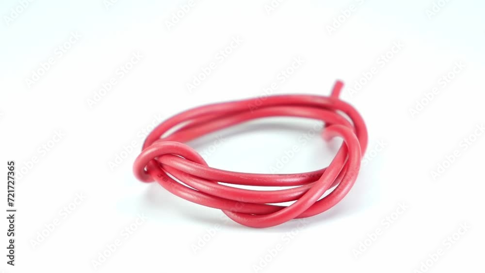 red wire cable of usb and adapter isolated on white background.Electronic Connector.Selection focus.Slow motion macro footage. red wire cable of usb and adapter isolated on white background.Electronic Connector.Selection focus.Slow motion macro footage.