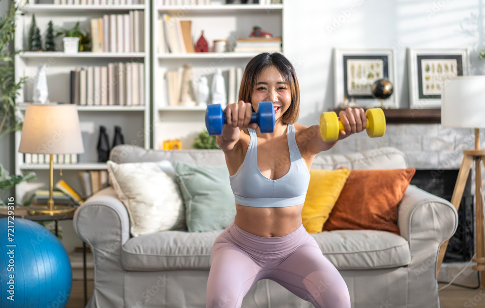 Portrait of sport slim fit strength asian woman training in sportswear relax and practicing yoga, fitness, exercise, wellness, workout, sport at home.Diet concept.Fitness and healthy lifestyle Portrait of sport slim fit strength asian woman training in sportswear relax and practicing yoga, fitness, exercise, wellness, workout, sport at home.Diet concept.Fitness and healthy lifestyle