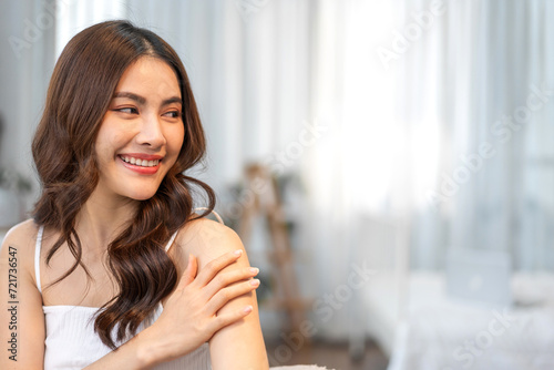 Portrait of smiling beautiful pretty asian woman clean fresh healthy white skin posing smile in pajamas white clothes, skincare, lady, model, cosmetic, fashion.Girl relax, enjoy at home.asia beauty