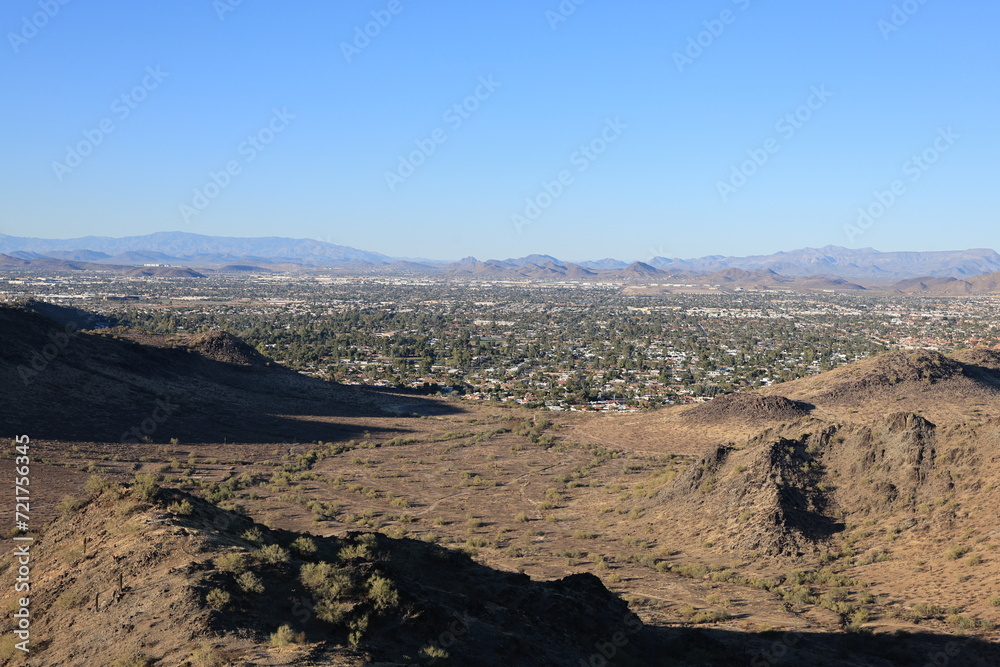 Moon Valley in North Phoenix as seen from across hills and buttes from North Mountain Park hiking trail, Arizona