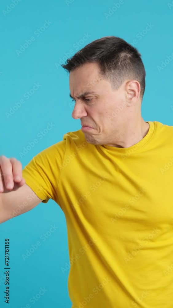 Man is ashamed that his armpit smells Man is ashamed that his armpit smells