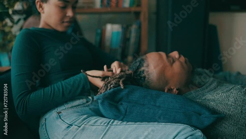Relax, home and black couple braiding hair for bonding, happy relationship and embrace on floor. Dating, love and African man and woman in conversation, talking and chat for romance in living room