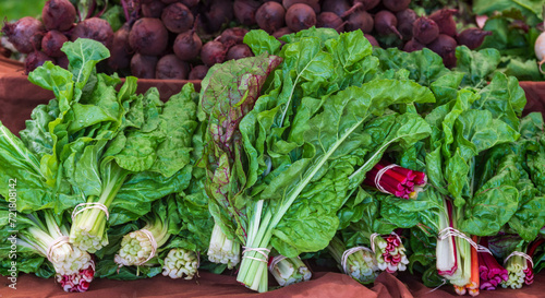Fresh leafy greens tied in bunches are for sale at a Farmers Market on Kauai.