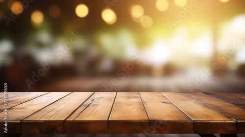 Rustic wooden table surface with a warm bokeh light effect in the blurred background, inviting and cozy.
