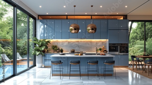 Cuisine moderne avec vue luxuriante : design bleu élégant, lumière naturelle abondante et lien harmonieux avec l'extérieur © jp