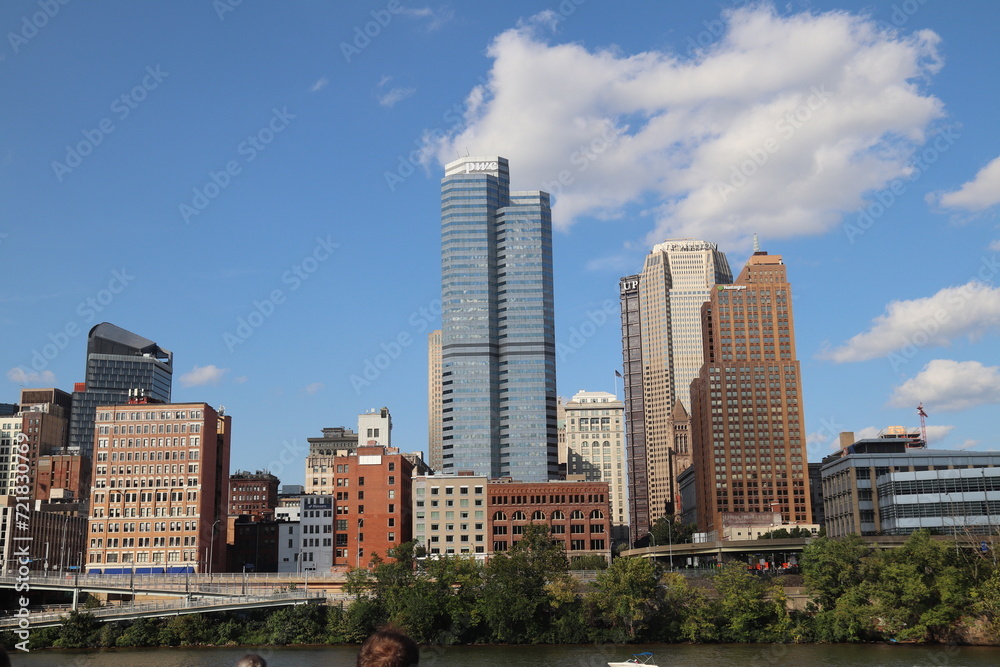 Panoramic view of downtown and river. Architecture of Downtown Pittsburgh. Southwest Pennsylvania at the confluence of the Allegheny River and the Monongahela River. Panoramic view of downtown and river. Architecture of Downtown Pittsburgh. Southwest Pennsylvania at the confluence of the Allegheny River and the Monongahela River.