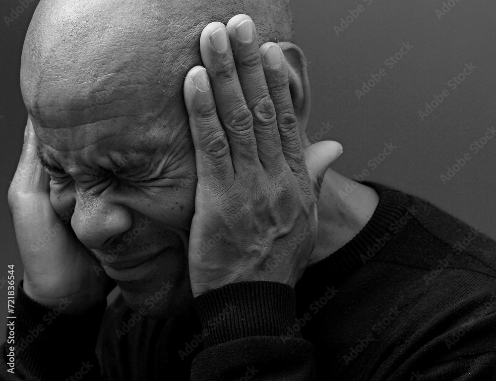 Fototapeta premium deafness suffering from hearing loss on grey black background with people stock image stock photo 