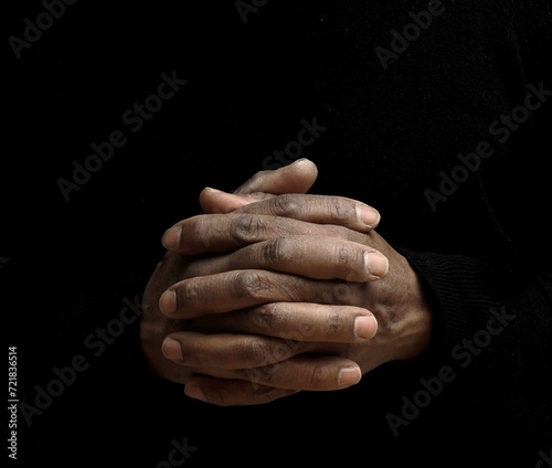 people praying to god with black background stock image stock photo