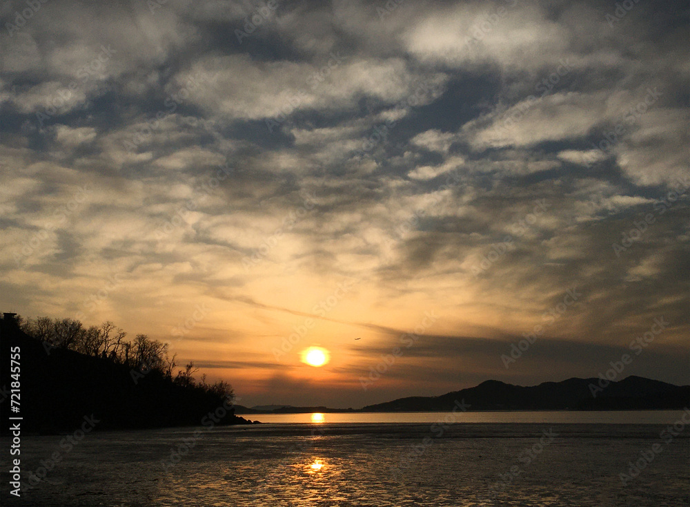 sunset over the river sunset over the river