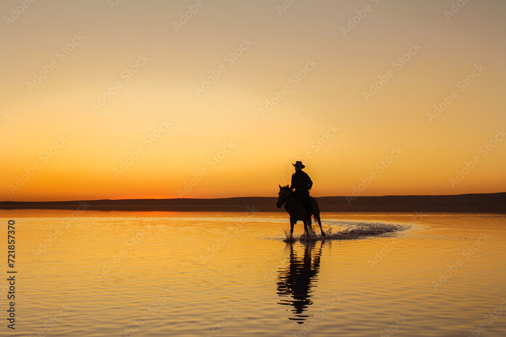 Magnificent show of cowboys at sunset in Salt Lake in Turkey