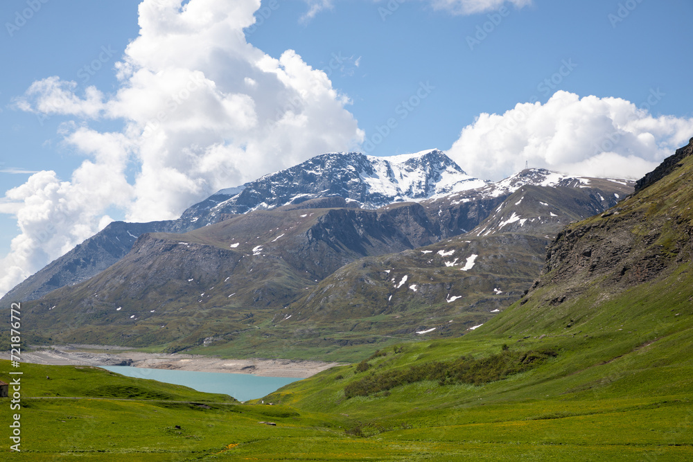 summer view Mont-Cenis lake massif at altitude of 1,974 m in commune of Val-Cenis in french Alps near Italy