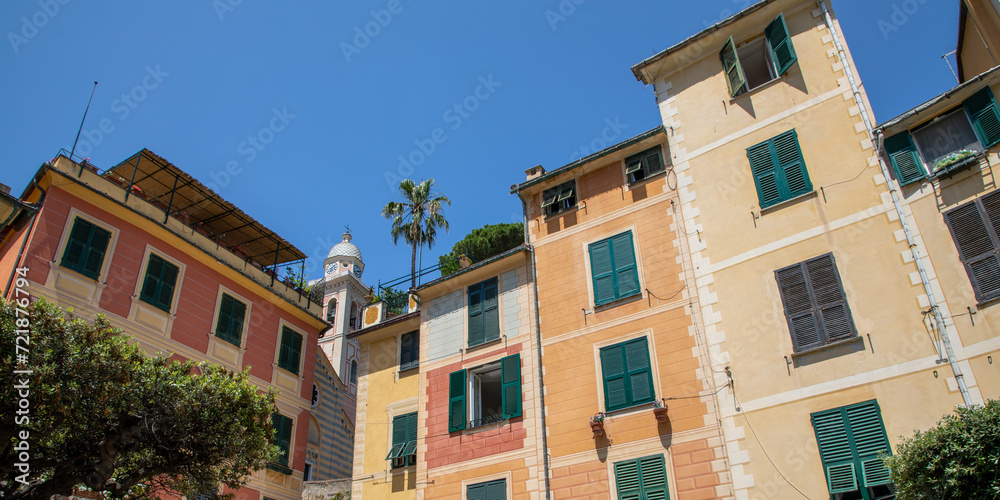 Naklejka premium Village Portofino with colorful facade buildings and bell tower in Liguria Italy