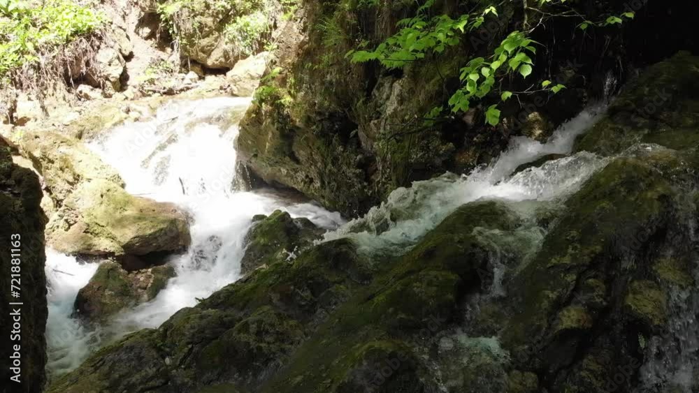 Caucasus. North Ossetia. Kurtat gorge. Stream on stones in the forest. Caucasus. North Ossetia. Kurtat gorge. Stream on stones in the forest.