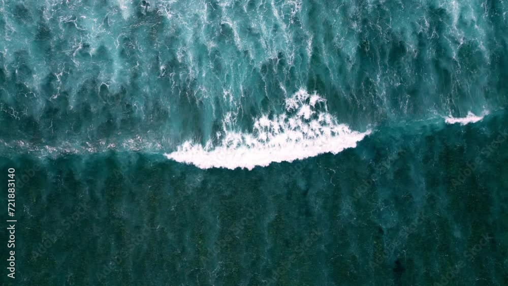 Beautiful quadcopter view of the dark blue waves. Aerial view of the dramatic ocean with beautiful waves.
