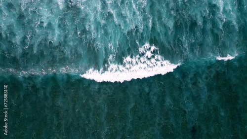 Beautiful quadcopter view of the dark blue waves. Aerial view of the dramatic ocean with beautiful waves.