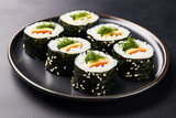Close up view of a Sushi with crispy nori algae on a ceramic  plate. Shallow depth of field