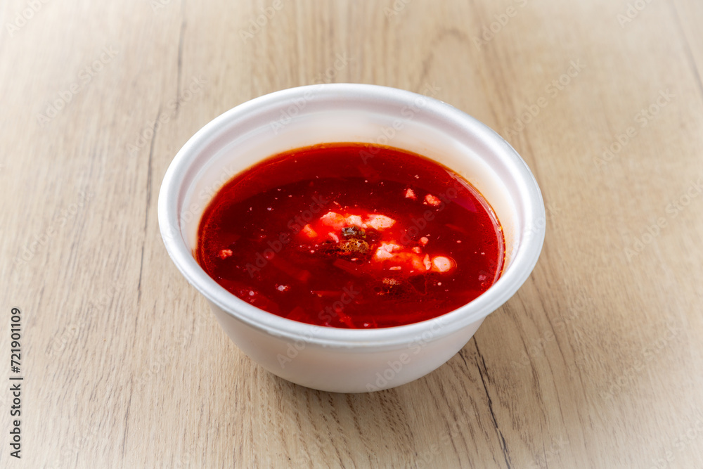 Borscht soup On a light wooden background. Borscht soup On a light wooden background.