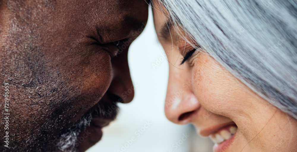Obraz premium cinematic image of an happy multiethnic senior couple.