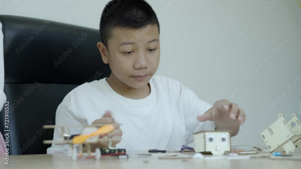 Asian children and toys, educational technology, engineering and STEM education concept Asian children and toys, educational technology, engineering and STEM education concept