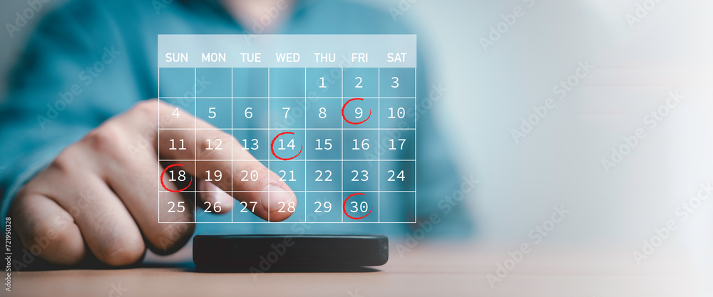 Businessman touching to smartphone with calendar and red circle mark for booking reminder appointment meeting and planing schedule concept. - obrazy, fototapety, plakaty 