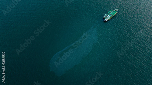 Oil leak from Ship, industrial petroleum products Vessel © Yellow Boat