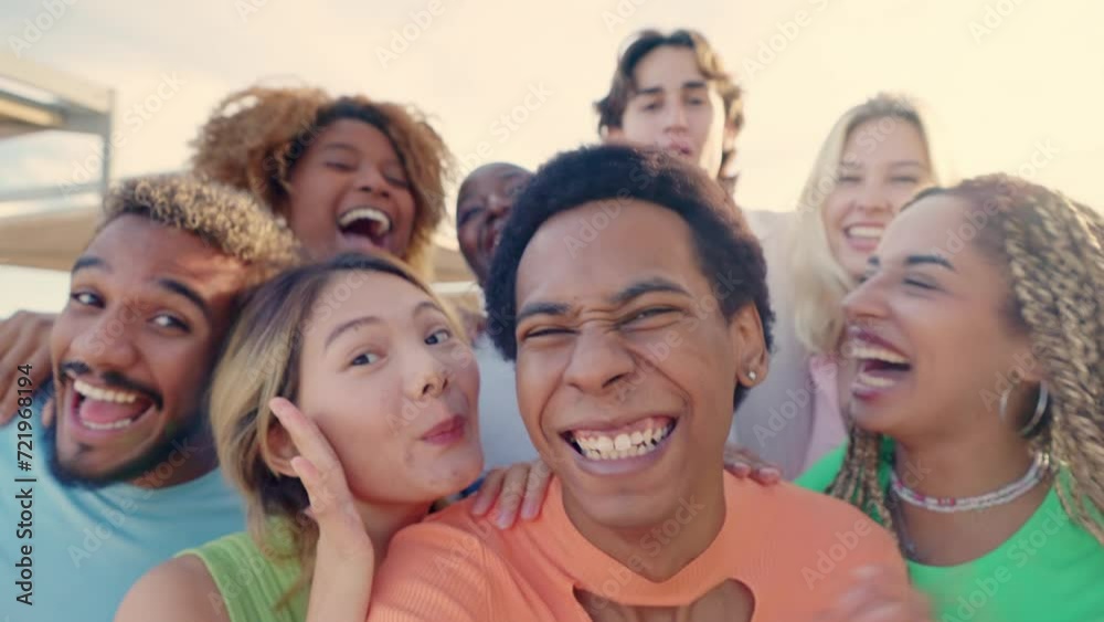 Smiling crazy multi-ethnic people taking selfies during sunset