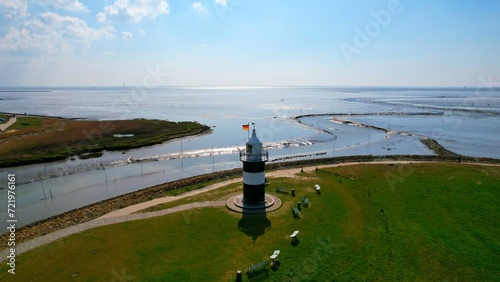 Little Preusse lighthouse - Wurster North Sea coast - Wremen - Northern Germany - Aerial view with a fantastic view of the Wadden Sea in the background